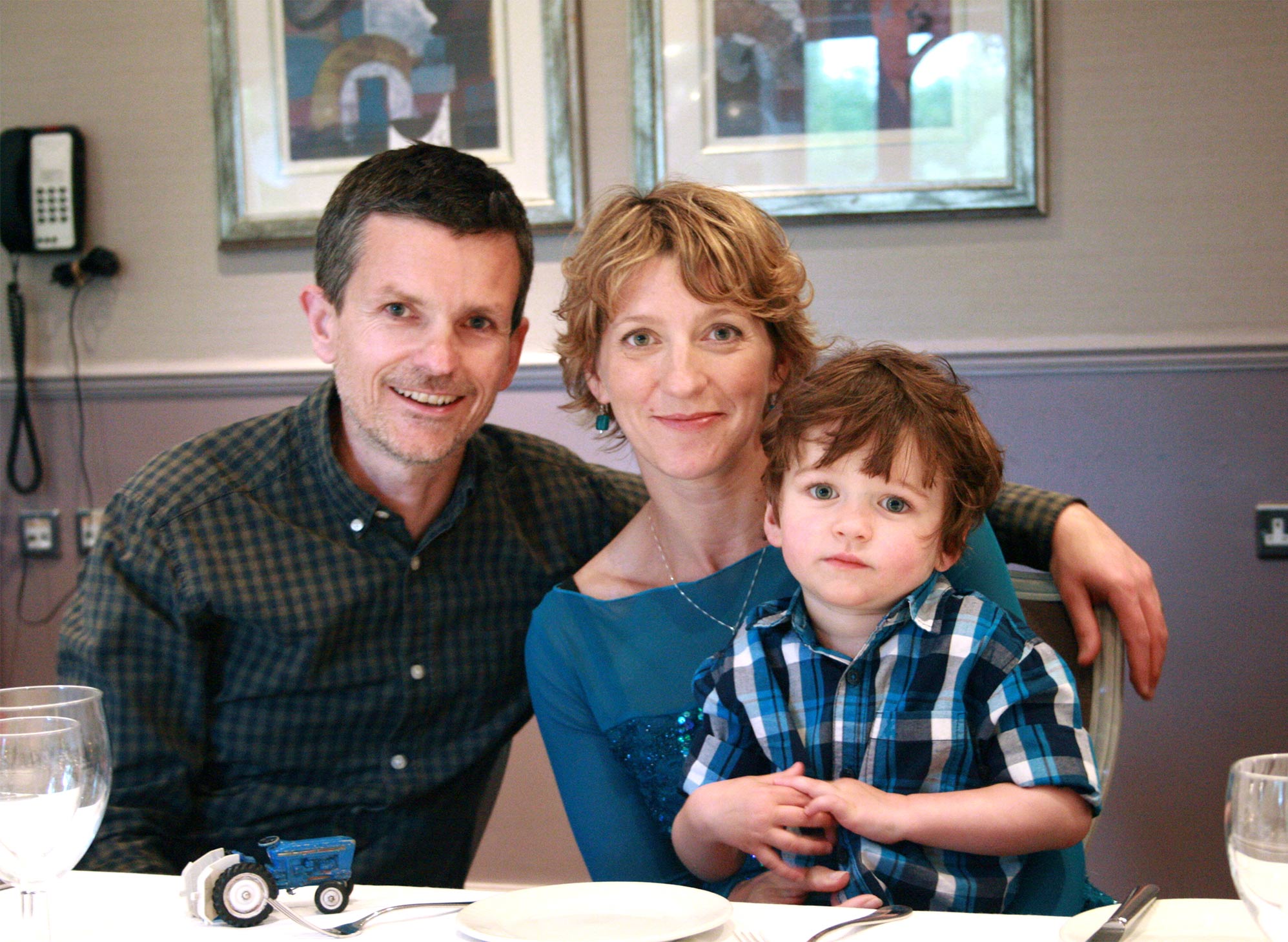 Drew Barker-Wright with his parents Mel and Jon